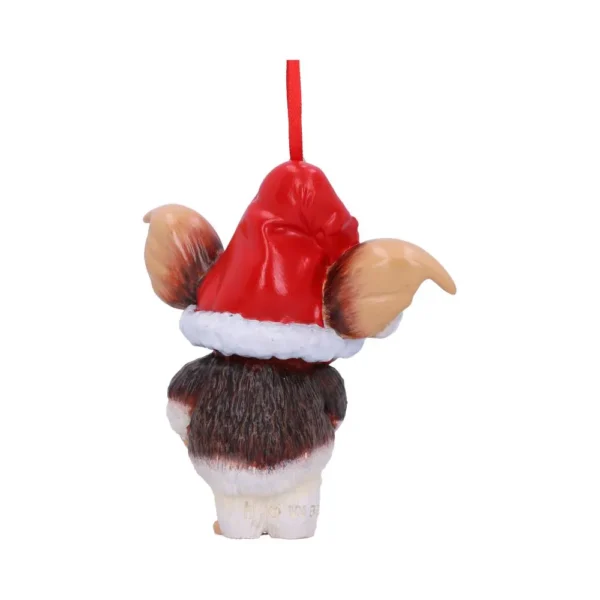 A cute Gizmo-inspired Christmas ornament wearing a red Santa hat with hanging ribbon. The-Hidden-Hatch