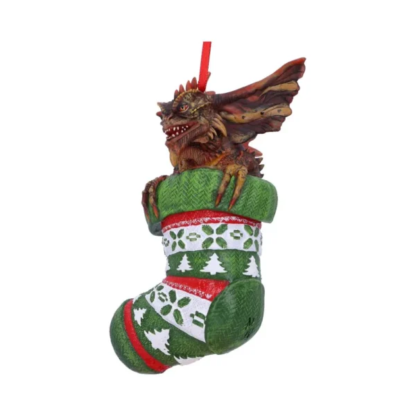 A red and brown dragon emerging from a green Christmas stocking ornament The-Hidden-Hatch