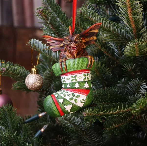 Gremlin Christmas Ornament Stocking Figurine - Green Red Festive Gremlin Christmas ornament peeking from a festive stocking on a decorated tree The-Hidden-Hatch