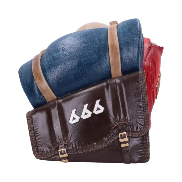 Brown Vinyl Adventure Backpack Sculpture - Blue Roll Accent Stylized brown adventure backpack sculpture with blue rolled blanket and embossed white “666” numbers.