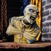 Decayed Skeletal Monster Bust Resin Sculpture - Chains and Collar Bust of Iron Maiden's Eddie a decayed skeletal monster with chains and metal collar against a dark gothic background.