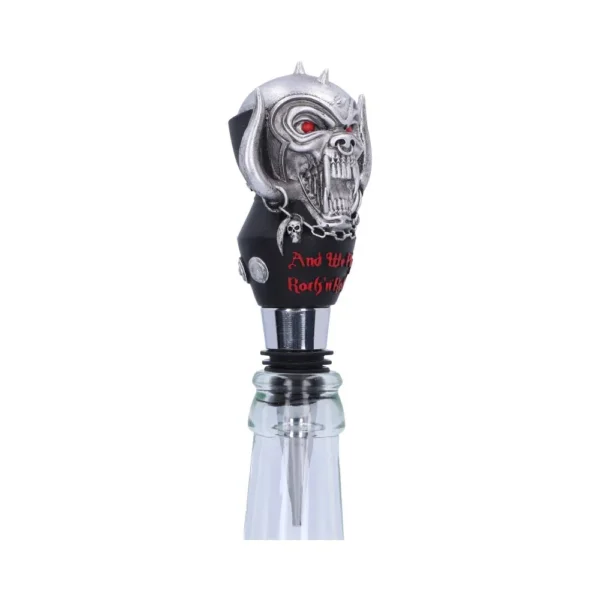 Metal beast head bottle stopper with red eyes and gothic design on a whisky bottle. The-Hidden-Hatch