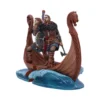 Viking Warrior Figurine Resin Statue - Dragon Ship Design Two detailed Viking warrior figurines aboard a carved dragon-headed longship amid crashing ocean waves.