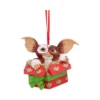 Gizmo Holiday Ornament Resin Red Gift Box - Green Ribbon Gizmo Christmas ornament popping out of a red and gold gift box with green ribbon The-Hidden-Hatch