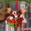 Gizmo Christmas Ornament Resin Red Green Gift Box - Festive Charm Licensed Gifts Buying Gizmo Christmas ornament in red and green gift box hanging on a tree branch The-Hidden-Hatch