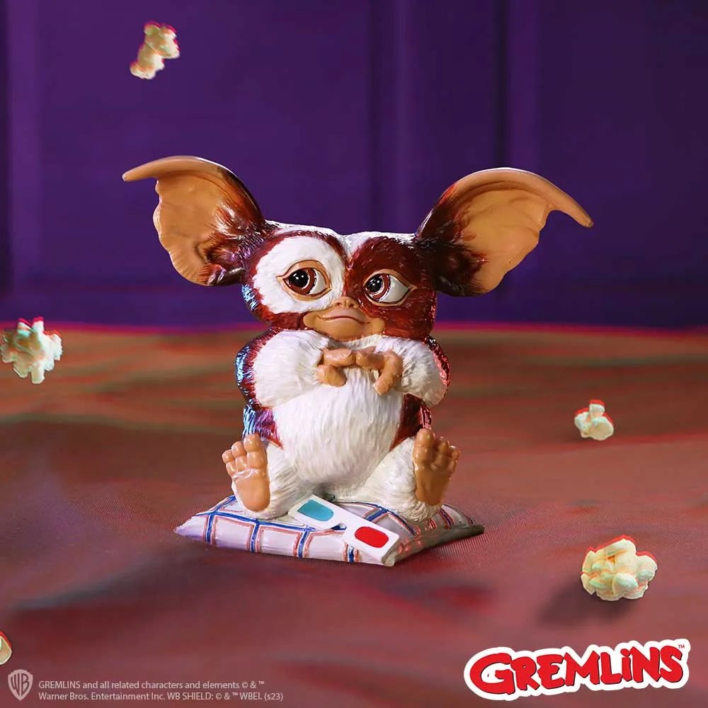 Alternative Homeware Trends to Watch 4 Gizmo Mogwai figurine on cushion with 3D glasses and popcorn, purple background The-Hidden-Hatch