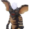 Gremlin Creature Figure Resin Sculpture - Dark With White Mohawk Collector shelf Close-up of a reptilian, bat-eared gremlin creature with sharp teeth and white mohawk hair The-Hidden-Hatch