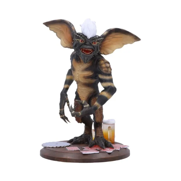 Gremlin Figurine Resin Statue Brown - Cards And Beer Base Display A detailed gremlin figurine holding cards and beer on a wooden base The-Hidden-Hatch