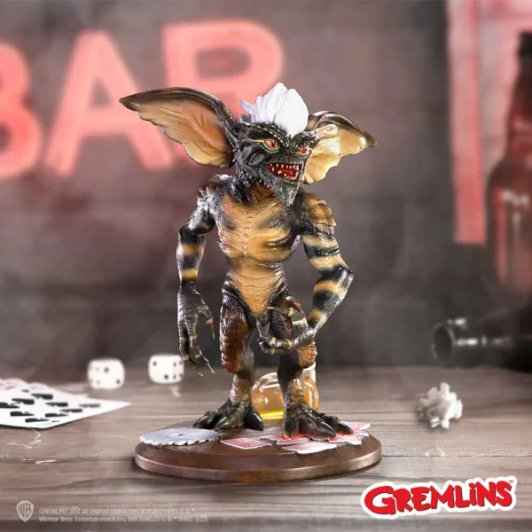 Stripe Gremlin Collectible Figurine - Dark Scaly Finish Base Stripe Gremlin figurine standing on a gaming-themed base with bar background. The-Hidden-Hatch