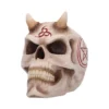 A demonic sculpted skull with horns and red occult symbols on an aged bone surface.