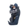 Batman And Catwoman Sculpture Resin Statue - Dark Embrace A sculpted figure of Batman and Catwoman kissing in a dramatic embrace.