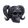 A black gothic skull sculpture with silver details, pentagram, and large curled ram horns.