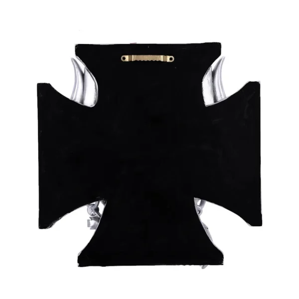 Black iron cross wall plaque with silver horn-like accents on white background. The-Hidden-Hatch