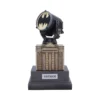 A detailed Bat-Signal model atop the Gotham City Police Department building collectible display.