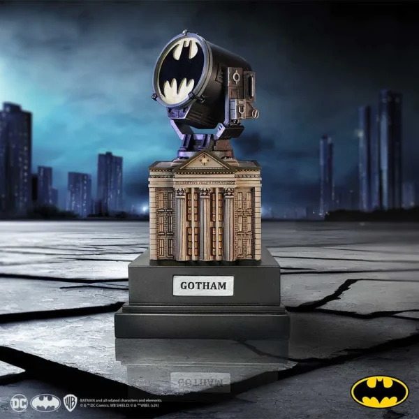 A detailed miniature Bat-Signal model on a Gotham City-style base with official DC branding.