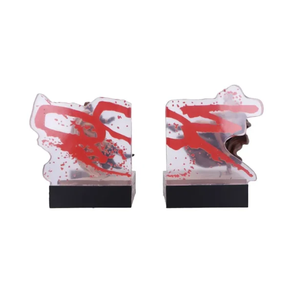 Abstract Acrylic Resin Bookends Red Accents Bronze Face Design Abstract acrylic and resin bookends with red accents and bronze-toned sculptural face details.