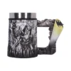Batman Metal Mug Black Engraved Joker Design Bat-Signal Handle A metal Batman-themed mug featuring engraved Joker artwork and a sculpted Bat-Signal handle.