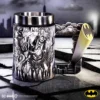 Batman Joker Mug Metallic Silver - Bat-Signal Handle Design Batman-themed metallic mug featuring the Joker design with a Bat-Signal handle on Gotham rooftop background.