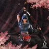 Assassin's Creed Shadows Naoe. Statue of Assassins Creed Shadows Naoe. Assassin from Assassin’s Creed Shadows holding a katana amid drifting cherry blossoms.