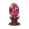 Red Dragon Crystal Egg Sculpture - Glowing Enchanted Stand A small red dragon encased in a glowing glass egg on a dark ornate stand.
