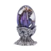 Purple Dragon Egg Sculpture Glass Resin - Silver Claw Stand A small purple and gold dragon encased in a clear glass egg on a silver claw stand.