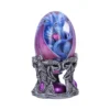 Blue Dragon Fantasy Sculpture Resin Egg - Purple Silver Base A blue dragon inside a purple-pink crystal egg with a silver ornate base.
