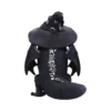 Black Dragon Figurine Resin Statue - Wizard Hat Fantasy Decor A black dragon figurine wearing a wizard hat decorated with white stars and crescent moons.