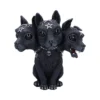 A black three-headed Cerberus dog figurine with gothic symbols and metallic accessories.