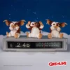 Gizmo Mogwai Figurine Set Resin Brown - See Hear Speak Trio Three Gizmo figurines on a retro flip clock under a starry night sky The-Hidden-Hatch