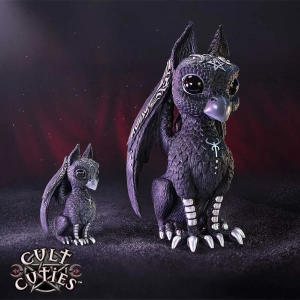 Cult Cuties Fantasy Figurines Purple Silver Accents - Gothic Charm Two gothic purple dragon-bird figurines with silver accents and large black eyes on a dark background.