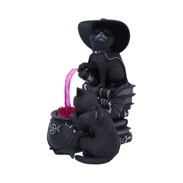 Two black cats brewing a pink potion in a cauldron with witchy hats and books.