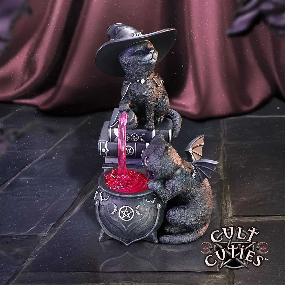 Fantasy Gifts vs Generic Presents - Choosing alternative gifts 2 Gothic Tableware Two black cats brewing pink magical potion in a gothic cauldron with spellbooks and occult symbols.
