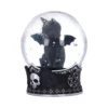 Gothic Black Cat Snow Globe - Silver Stars and Bat Wings A gothic snow globe featuring a black cat with bat wings and silver stars inside.
