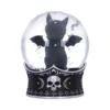 Gothic Black Cat Snow Globe - Silver Skull Base and Bat Wings A black cat with bat wings inside a gothic snow globe featuring skull and moon decorations.