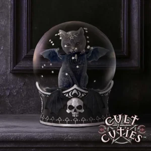 A gothic black cat with bat wings inside a dark, ornate snow globe with skull details.