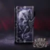 A black cat with bat wings framed in silver gothic design under a moonlit night sky.