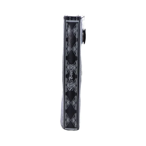 Skysliver Black Hardcover Book Spine - Silver Ornate Design A black hardcover book spine with silver ornate designs and the title “SKYSLIVER.”
