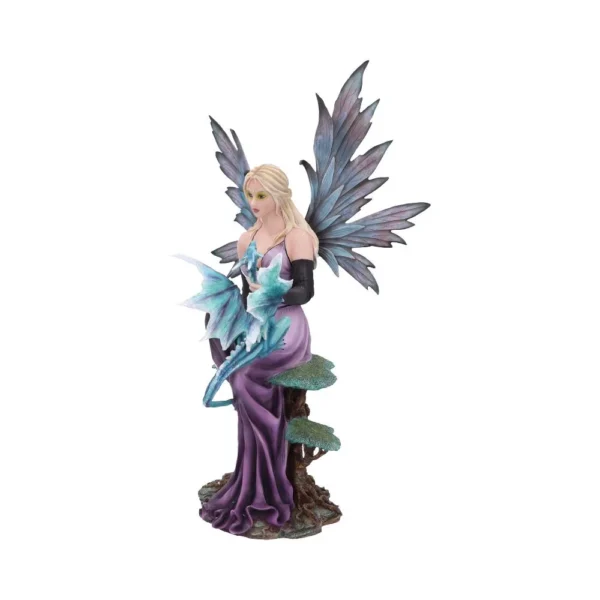 A fairy figurine in a lavender gown sitting on a tree stump with a small blue dragon.