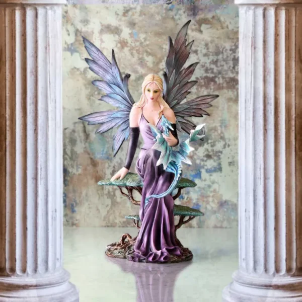 Lavender Fairy Figurine Resin Sculpture - Turquoise Dragon Accent A lavender fairy figurine holding a turquoise dragon between marble columns on a reflective surface.
