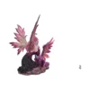 A fairy figurine gently touching a small purple dragon on a rocky base.