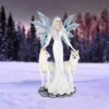 Winter Goddess Figurine Resin Statue White - Crystal Wings & Wolves Ethereal winter goddess with crystal wings standing beside two white wolves in a snowy forest.