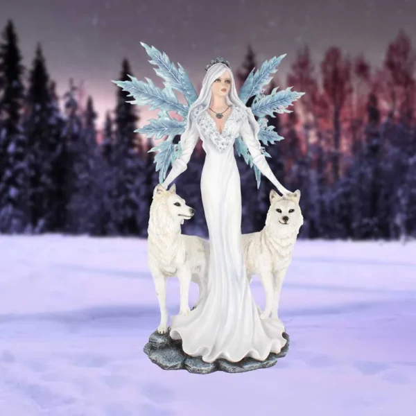 Winter Goddess Figurine Resin Statue White - Crystal Wings & Wolves Ethereal winter goddess with crystal wings standing beside two white wolves in a snowy forest.