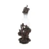 Octopus Glass Decanter Set Bronze Sculpture Nautical Theme Octopus-shaped bronze glass decanter set holding clear bottle and two shot glasses on ocean-themed base.