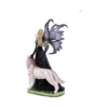 Fairy Figurine Resin Sculpture Black Dress With White Wolf A fairy figurine with dark wings stands beside a white wolf on a grassy base.