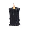 A realistic black LED candle with melted wax design and warm glowing flame.