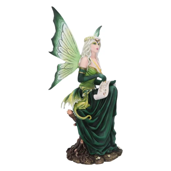 A detailed fairy figurine with green wings sitting on a tree stump beside a small dragon.