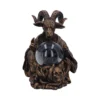 A bronze goat-headed Baphomet statue holding a glowing crystal orb with occult symbols.
