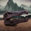 Dinosaur Fossil Skull Sculpture Brown Stone - Misty Mountain Scene Fossilized dinosaur skull on rocky terrain with misty mountains in the background