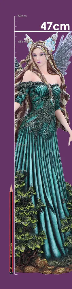Emerald Fairy Figurine Resin Sculpture - Butterfly Wings Design Tall emerald fairy figurine with butterfly wings standing beside a pencil for size comparison.