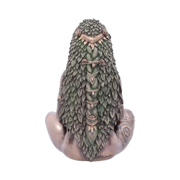 Bronze nature goddess sculpture with leafy hair and floral adornments in a seated meditative pose.